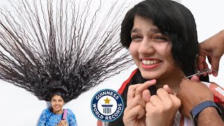 Cutting The Worlds LONGEST HAIR  Guinness World Records [upl. by Anom811]