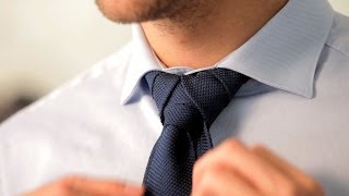 How to Tie a Merovingian Knot  Mens Fashion [upl. by Namar817]