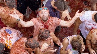 La Tomatina  Festival Discoveries  World Nomads [upl. by Adalie]